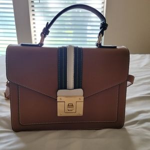 Medium-sized bag with removable straps.